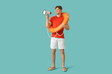 Male lifeguard with ring buoy and loudspeaker on blue background