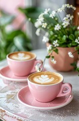 Two Cups of Cappuccino Next to Potted Plant