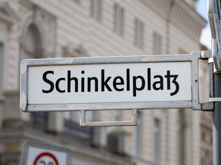 Schinkelplatz square sign in Berlin. Location name guide at a place in the district Mitte. German...