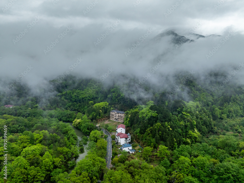 Wall mural Aerial photography of clouds and fog in the mountains