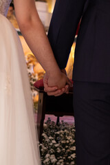 bride and groom hands, bride and groom, hands of the family, close up of couple holding hands, close up of hands holding each other, close up of hands, close up of hands holding hands, background