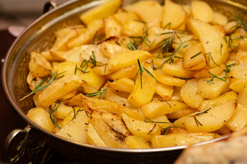 fried potatoes in a pan, rustic potatoes, sautéed potatoes, roast potatoes, english potatoes
