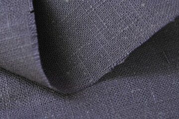 dark beige hemp viscose natural fabric cloth color; sackcloth rough texture of textile fashion...