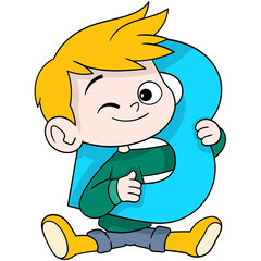 boy is sitting holding the letter B