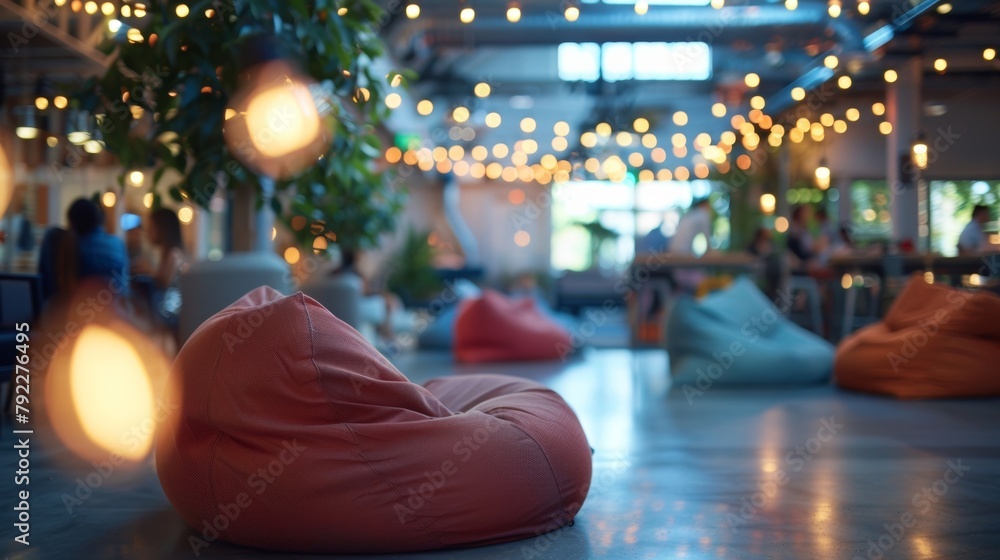 Poster the warm glow of string lights and the soft blur of bean bags and couches set the scene for a casual