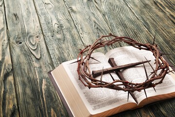 Holy Bible book, cross on light background