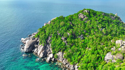 Picturesque rocky shores blend with lush greenery, coconut palms sway against the backdrop of azure...