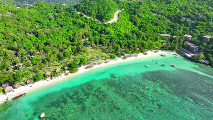 Discover paradise from a bird's eye view, pristine beaches, lavish resorts, lush greenery, and azure waters on a tropical island getaway. Aerial view. Tao island, Thailand. Nature background.
