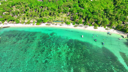 Experience aerial bliss over a tropical gem, stunning beaches, luxury resorts, and pristine waters...