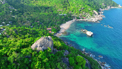 A picturesque blend of verdant forests, striking rock features, and mesmerizing clear turquoise...