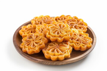 Indian sweet Imarti also called Amriti or Jalebi made by deep frying black gram flour batter in a circular shape on white background