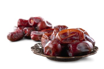 Plate with tasty dried dates for holiday Ramadan