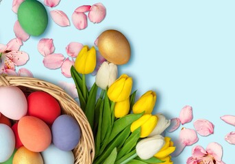 Fototapeta na wymiar Easter Composition: colorful eggs, fresh flowers