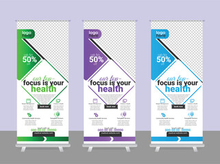 Medical roll up banner template for doctor and hospital service promotion.