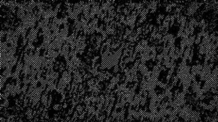 Fototapeta premium An abstract black and white halftone grunge texture background image.