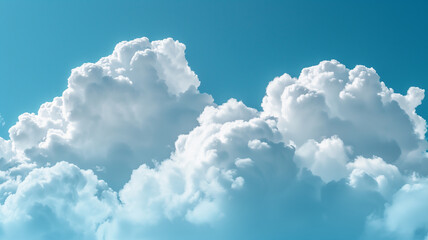 A close-up of fluffy white clouds against a clear blue sky