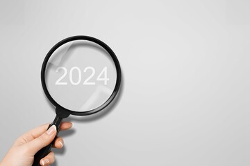 The image magnifier glasses with 2024 Trends concept