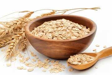 Oat flakes in bowl with spoon isolated on white