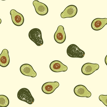 Hand drawn avocado seamless pattern, Vector sketch of whole avocado and cut in half randomly placed on a light green background