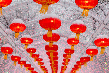 Red lanterns in the snow in the park. Chinese New Year holiday - 792418216