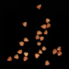 Fototapeta na wymiar Buckwheat isolated on a black background. Close-up