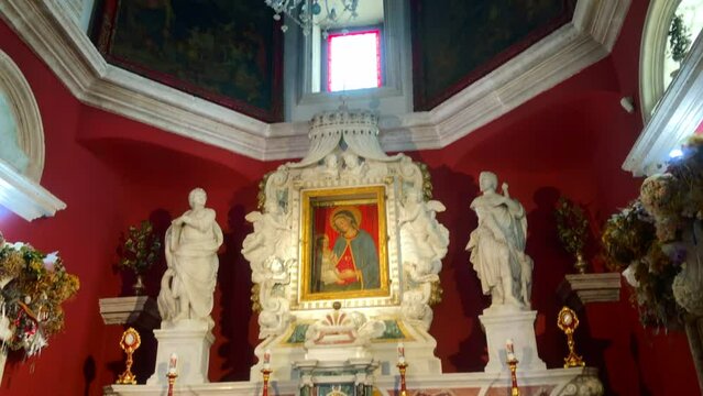 Interior view of the altar in a church. The Roman Catholic Church of Our Lady of the Rocks in the Bay of Kotor off the coast of the historic town of Perast, Montenegro. Europe.