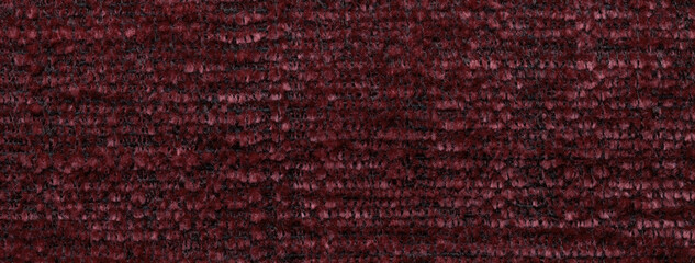Texture of fluffy woolen dark red textile background from soft fleecy material, macro. Structure of wine fabric