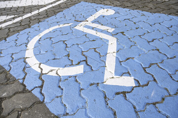 Disabled sign on the asphalt - 792425869
