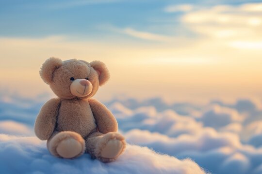 Toy bear sitting against cloudy sky wallpapers