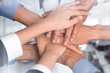 High five, team of businesspeople hands together