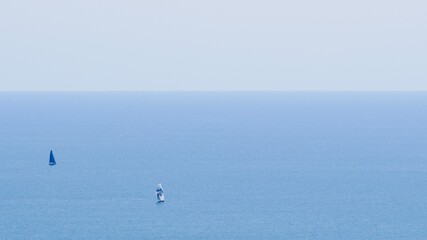 Fototapeta na wymiar Sailing ships sailing the sea with space for text.