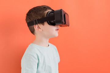 Child in virtual reality headset glasses