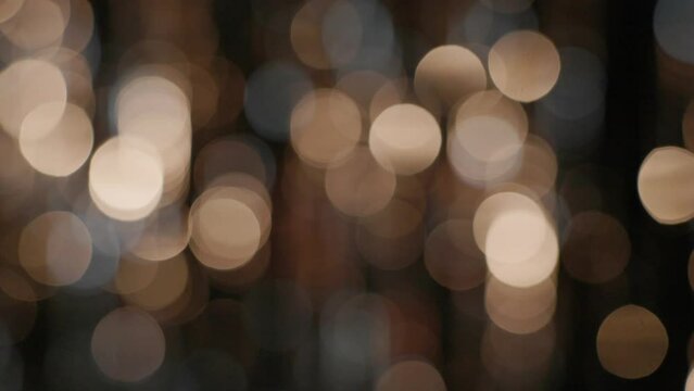 Lens bokeh golden glitters in slowmotion