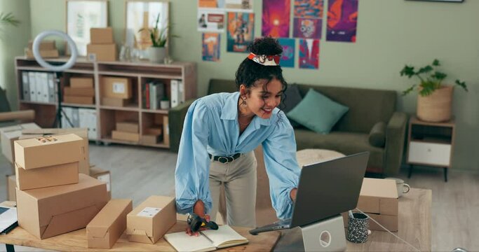 Woman, packaging and small business with laptop from home for creative designer, online shopping or order. Female person, ecommerce and boxes in living room or side hustle startup, delivery or retail
