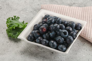 Sweet ripe blueberry on the bowl