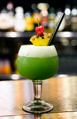 pineapple mint cocktail with cherry