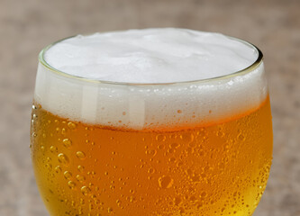 Close up of beer with bubbles in the glass
