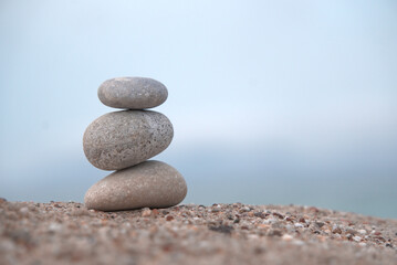 stack of zen stones against blurred background