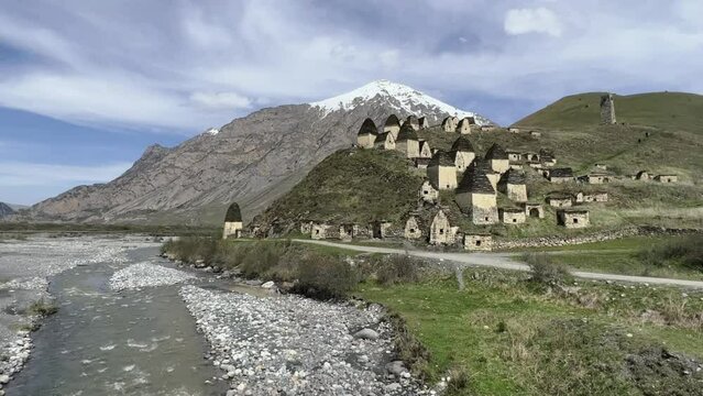 Dargavs is a unique city of the dead in North Ossetia. There are many houses and a crypt-tomb on the top of the rocky mountains. The City of the Dead on the mountainside near the Midagrabindon River. 