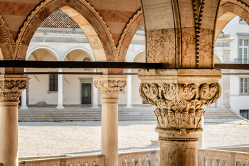 Detail of a capital and column inside a beautiful Italian Loggia. Udine city, Friuli Venezia Giulia...