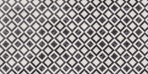 black and white geometric patterned  tile flooring texture isolated on white background. 