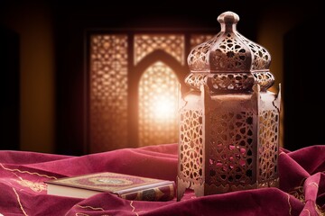 Ramadan arabic lantern with candle at night