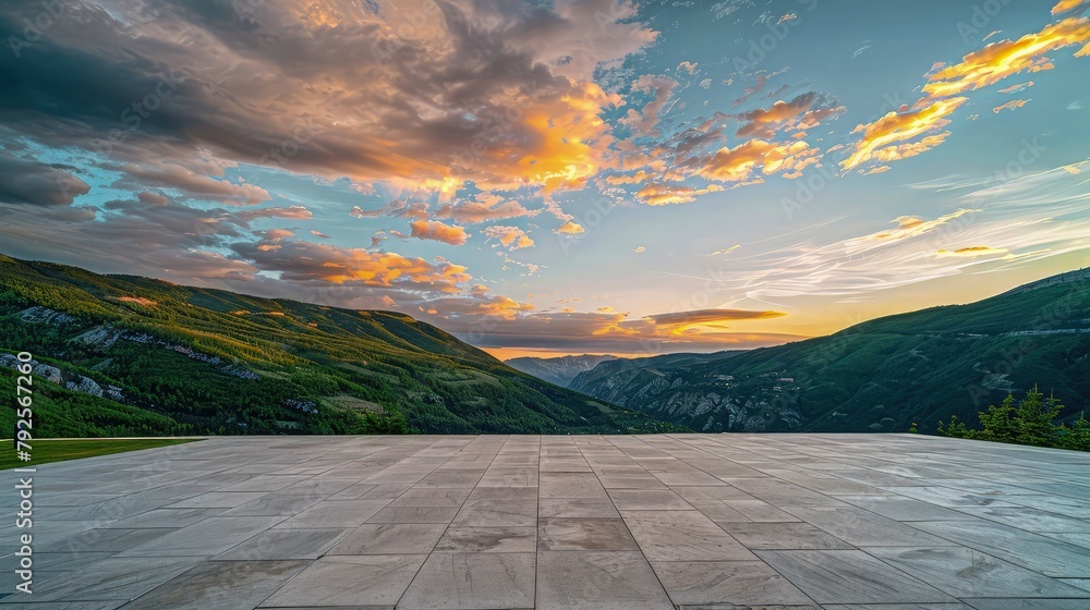 Poster sunset in the mountains with stone desk selective focus on desk with cloudy sky view