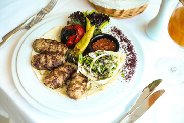 White Plate With Meat and Vegetables