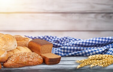Multi grain bread with cut on a board