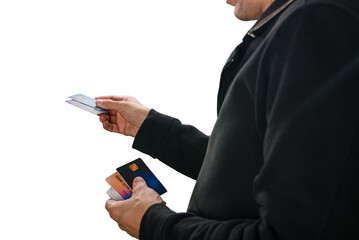 Young man making cashless payment with credit card isolated on white background. Financial tools: Image of person with payment cards, suitable for finance and banking designs