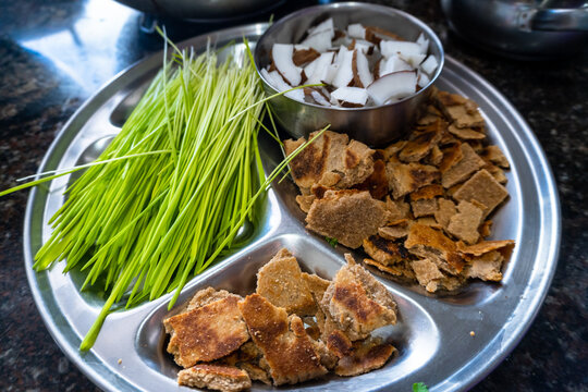 Navratri: Indian Goddesses festival in Uttarakhand, India. Cuisine offerings include meals with Barley (Jau grass) symbol.