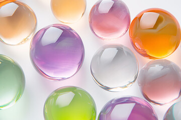A lot of different Gels in the bubbles on a white background, top view.