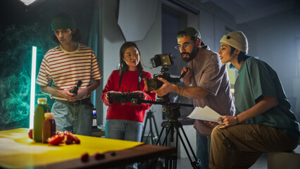 Diverse Young Film Crew Engaged In A Creative Video Production Session On A Vibrant Set, Surrounded...
