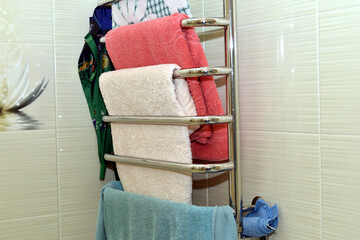 View of a towel dryer in a bathroom.